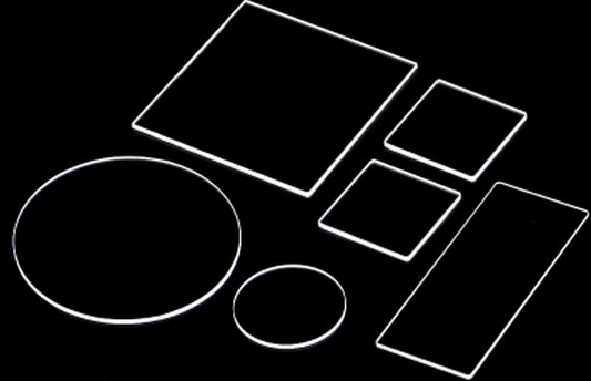 An image showing a high purity fused quartz wafer or substrate, with a purity level of over 99.99% and a transmittance of over 90% at 210nm to 300nm.